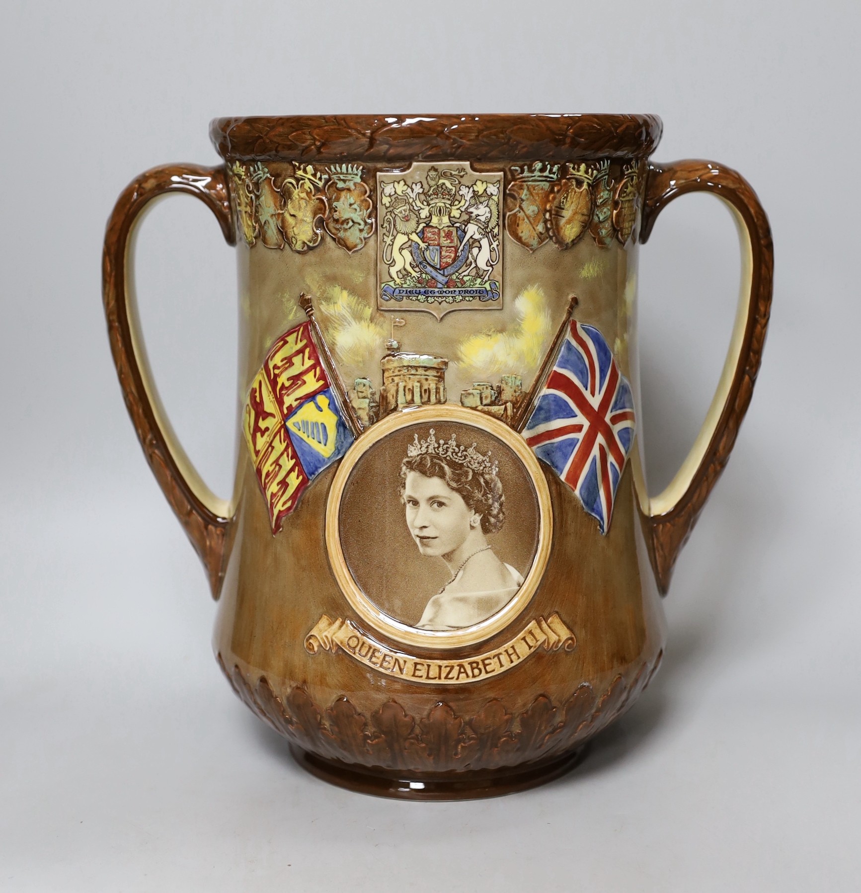 A Royal Doulton loving cup, Elizabeth II Coronation June 1953, 554 of 1000 with certificate signed by Art Director, Cecil J Noke, 27cms high